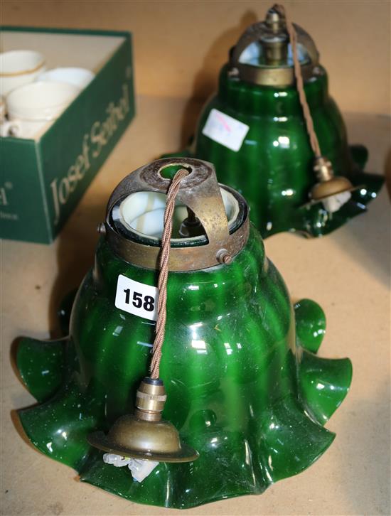 A pair of green glass lights